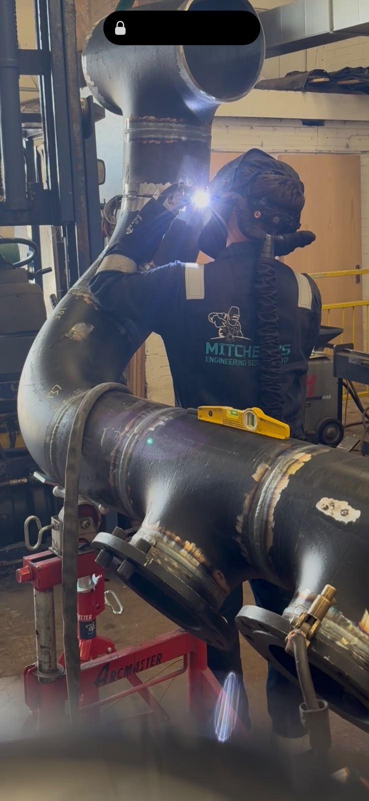 Mitchell's welder fabricating process pipework on site