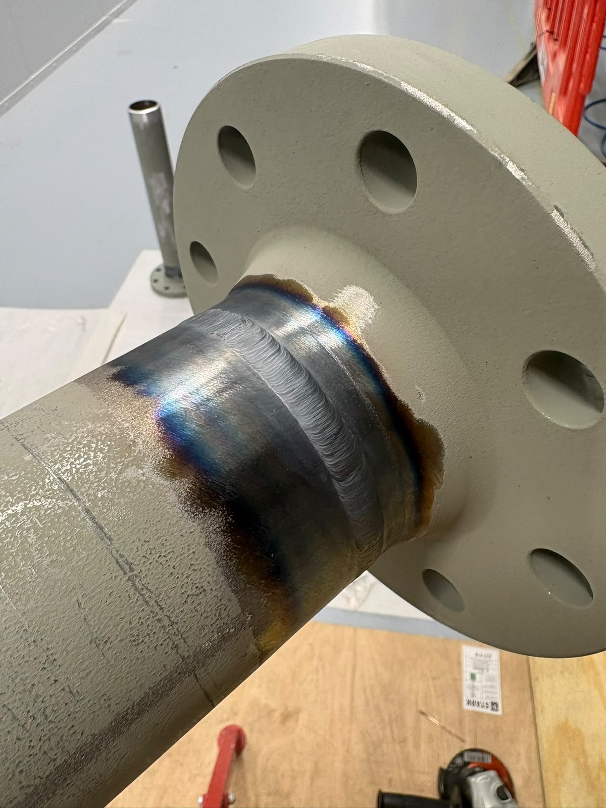 Stainless-steel flange weld on fabricated pipework